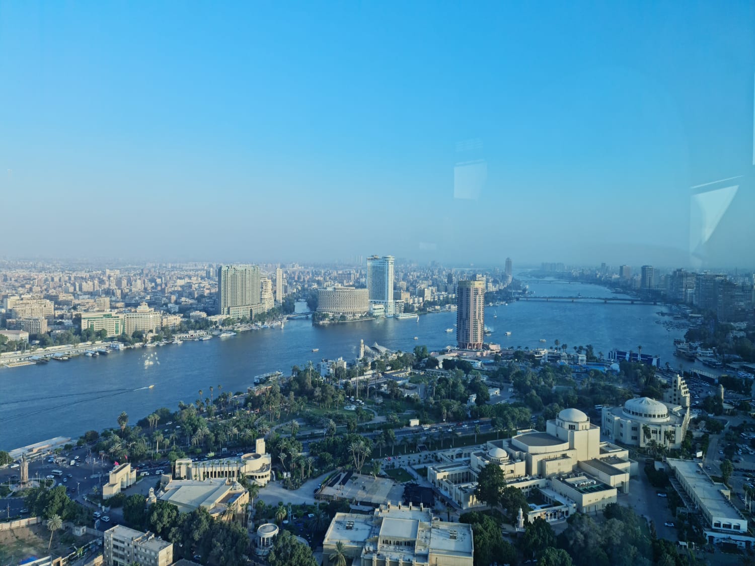 Panoramic view of the Nile and Cairo skyline at golden hour
