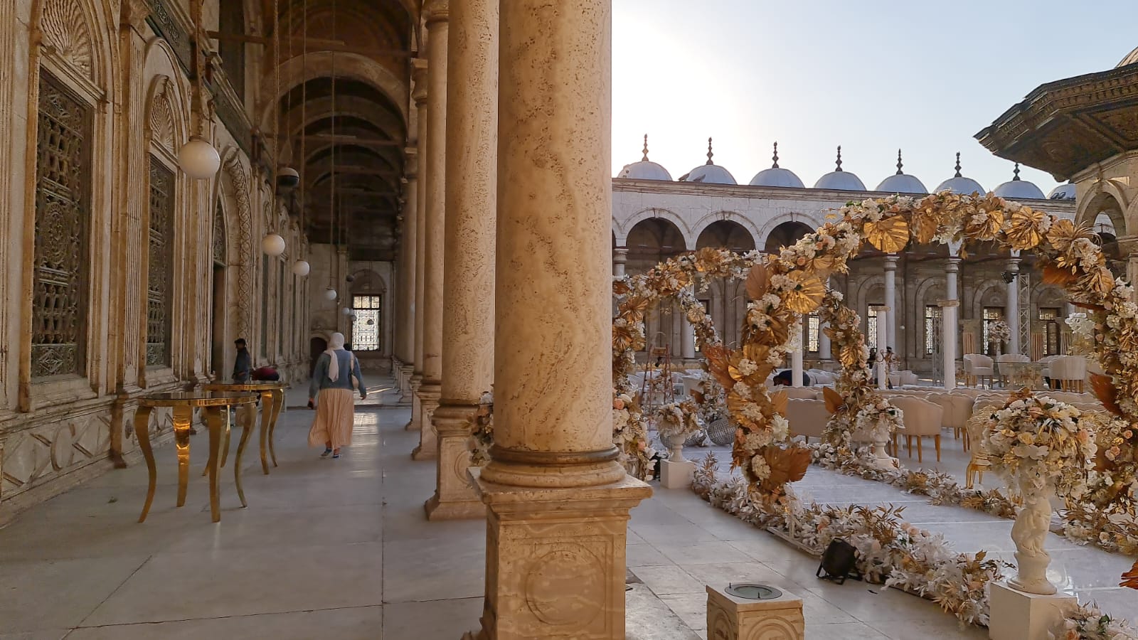 Marble arcades and floral decorations inside the Muhammad Ali Mosque courtyard