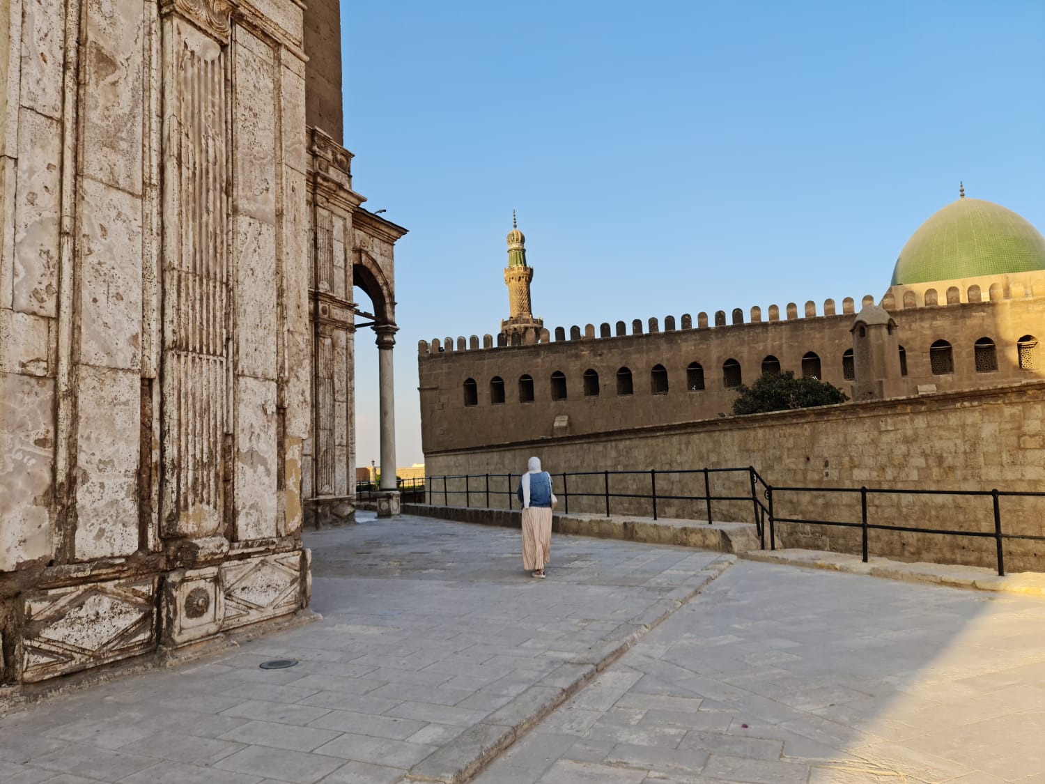 Historic Citadel mosque with green dome and minaret in Old Cairo