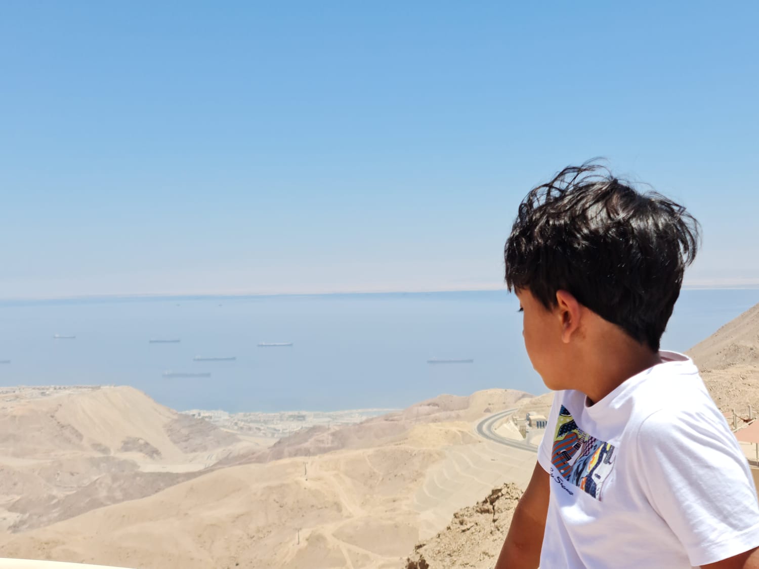 Young traveller gazing out at the Red Sea from Ain Sokhna